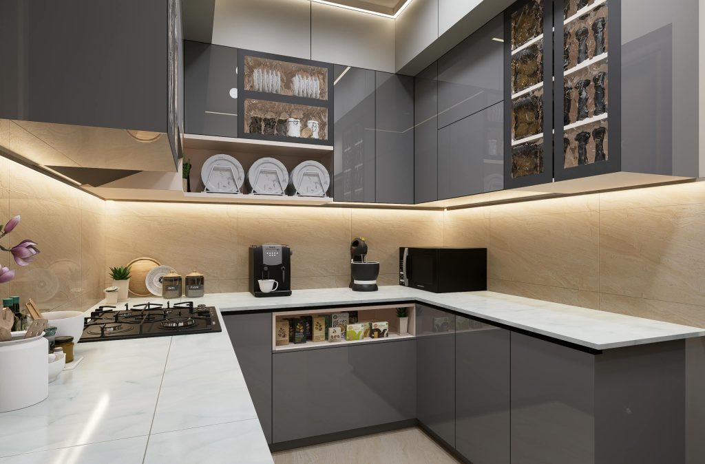 Sleek and modern kitchen with grey cabinets and marble countertops, featuring lighting.